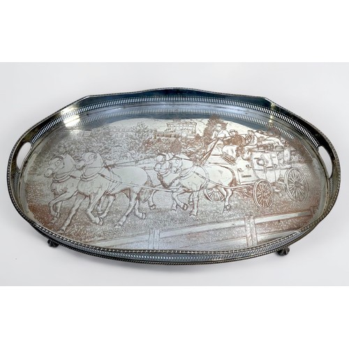 66 - A large oval silver-plated serving tray, with pierced gallery, serpentine rim and pierced handles to... 