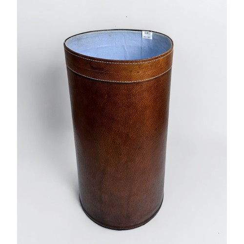 416 - A brown leather cylindrical umbrella stand by ‘The Holding Company’, 50cm tall