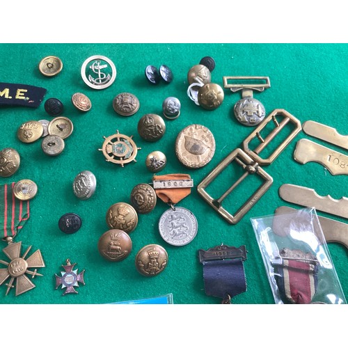 417 - A collection of military and other buttons and school attendance medals, some with the prices paid b... 