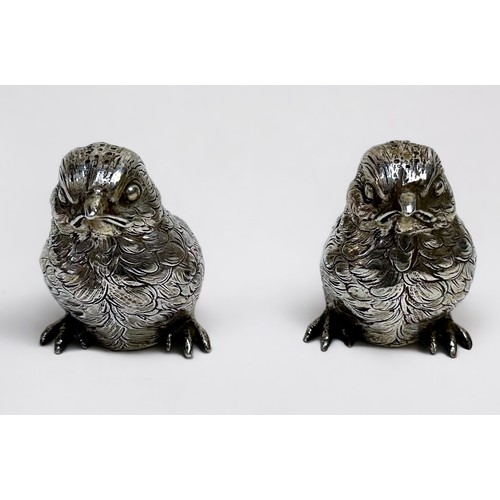 70 - A pair of continental novelty silver pepper pots modelled as chicks, import marks for Berthold Mulle... 