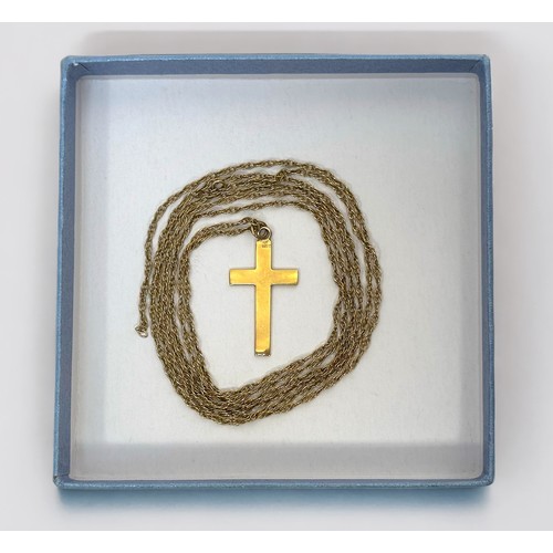 134 - A 9ct yellow gold cross and 9ct yellow gold chain, no clasp, total weight 8.3 grams.