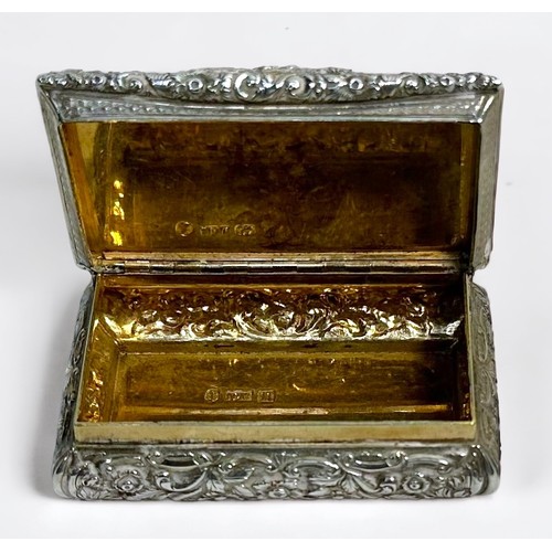 80 - An early Victorian silver snuff box by Nathaniel Mills, of rectangular form with hinged cover, the t... 