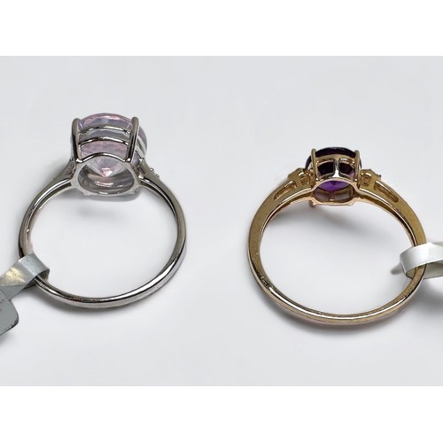 157 - A 10ct yellow gold dress ring, set with a round faceted amethyst to the centre, and three small diam... 