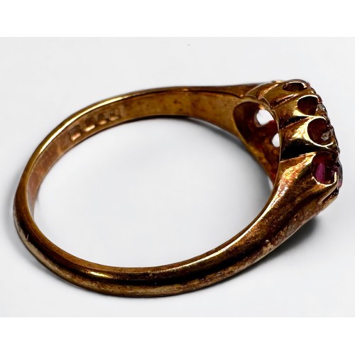 186 - An 18ct gold Victorian style, ruby and diamond ring, set with 3 x oval faceted rubies, surrounded by... 