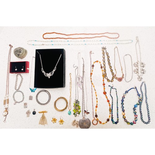 216 - A large selection of silver and costume jewellery, approximately 66 items, including, Gross of Germa... 