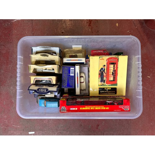 728 - A very large collection of over one-hundred (100) boxed die-cast scale model vehicles, across two bo... 