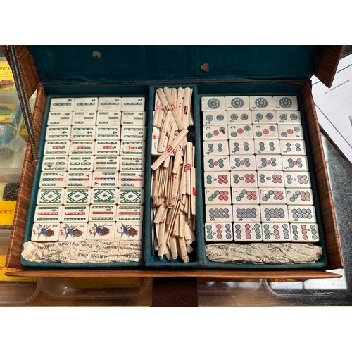 406 - A Wing Fat Cheong Mahjong ‘Chinese Game of Four Winds’ bamboo and bone set, in fitted box, with rule... 