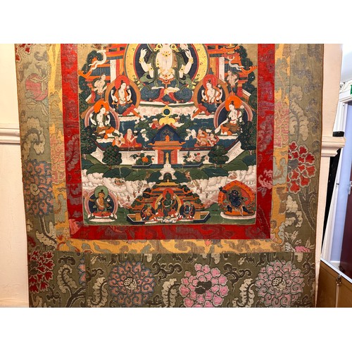 47 - A 19th Century Tibetan Thangka, (hanging prayer flag scroll) painted with central figure of Buddha s... 