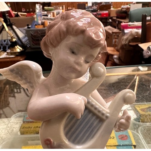 15 - Three boxed Lladro figures, to include, Asian Love, no. 06156, Adagio Angelical, no. 06628, and Alle... 