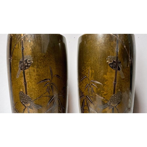 27 - A pair of Japanese inlaid bronze vases of tapering cylindrical form, Meiji Period, with inlaid mixed... 