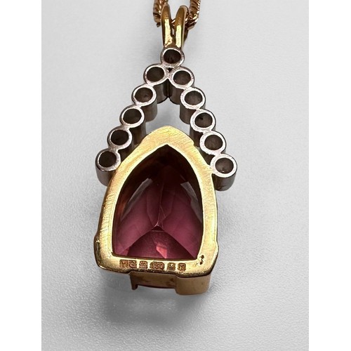 75 - A 14ct yellow gold pink topaz and diamond pendant and 18ct yellow gold curb chain, the heart shaped ... 