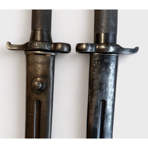 428 - Four Swedish M1896 pattern Rifle bayonets, with engine-turned grips, conical locking studs, metal sc... 