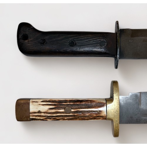 460 - A large hunting knife with 25cm blade, brass cross-piece and pommel, antler handle, with leather she... 