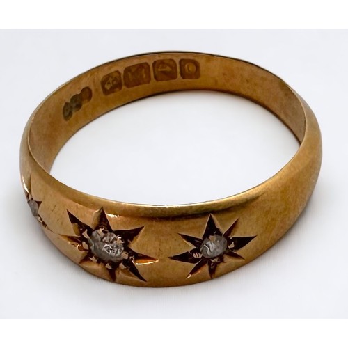 82 - An Edwardian 18ct gold ring, star set with three diamonds, total estimated weight 0.10cts, hallmarke... 