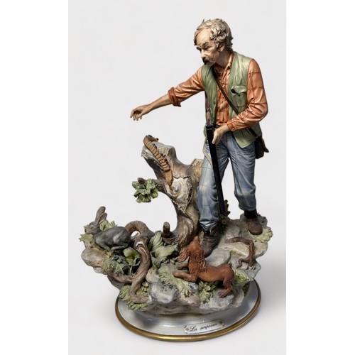 13 - Two Capodimonte figures comprising L’aiuto (The Fisherman), af, and La Sorpresa (The Hunter), by San... 