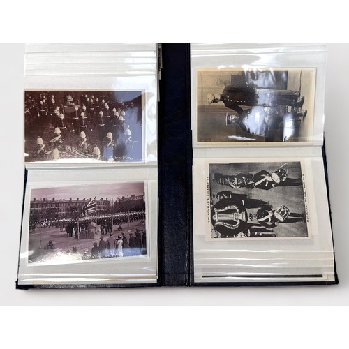 145 - A collection of reproduction postcards relating to Portsmouth and Royal Marines, including, an album... 