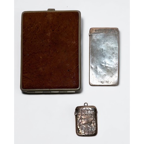 37 - A silver calling card case and a silver vesta, together with a white metal and leather cigarette cas... 