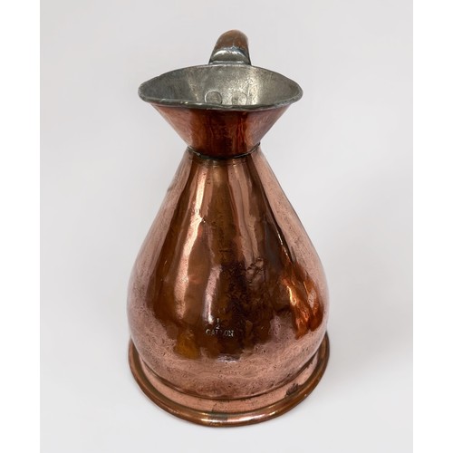 521 - A harlequin set of three graduated copper haystack jugs, the largest measuring 1/2 gallon, including... 