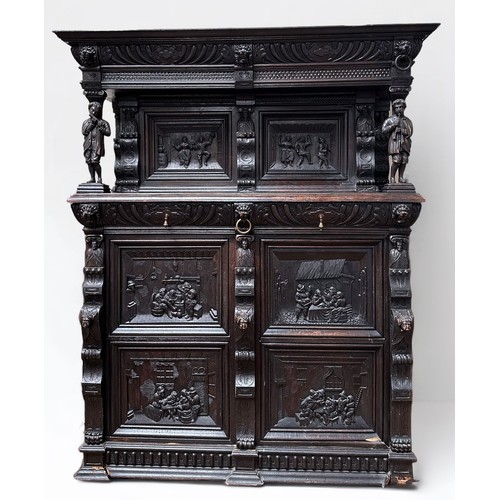 295 - A 19th century Flemish oak court cupboard, the moulded cornice over a carved frieze with lion's mask... 