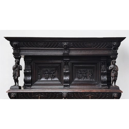 295 - A 19th century Flemish oak court cupboard, the moulded cornice over a carved frieze with lion's mask... 