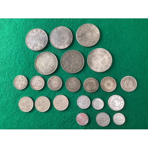 131 - A quantity of mainly white metal Chinese coins, all photographed obverse and reverse.