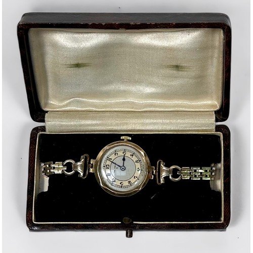 56 - A ladies ‘The Angus’ 9ct gold cased wristwatch, the silvered dial with Arabic numerals denoting hour... 