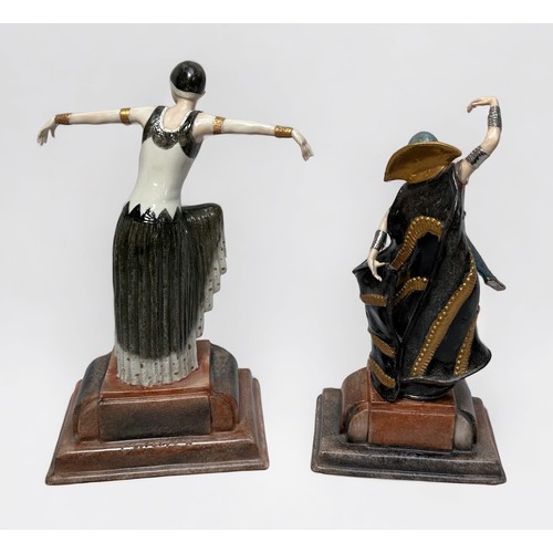 17 - A pair of Art Deco style ceramic figures of flapper dancers, raised on shaped bases, largest measure... 