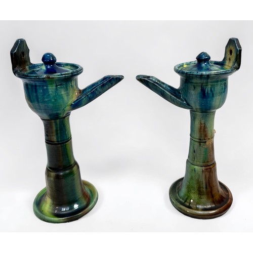 3 - A pair of 19th century pottery oil lamps, in the Whieldon ware style with green, blue, yellow and br... 