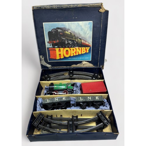 215 - Four boxed Meccano Hornby clockwork train sets comprising Tank Paasenger set no.41 (lacking tender) ... 