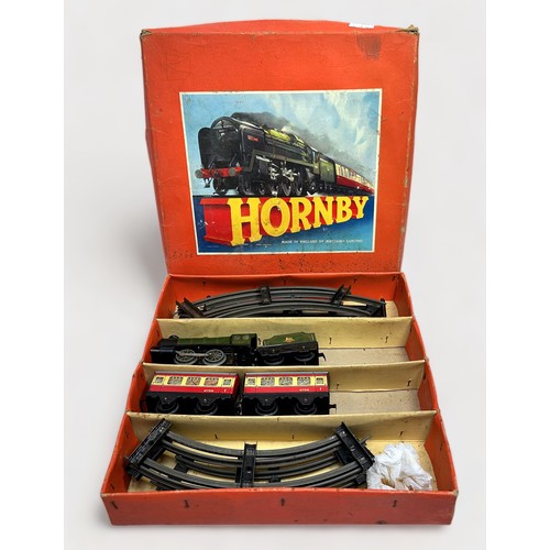 215 - Four boxed Meccano Hornby clockwork train sets comprising Tank Paasenger set no.41 (lacking tender) ... 