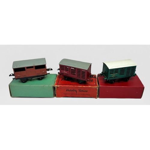 216 - A collection of eleven assorted boxed Meccano Hornby ‘O’ gauge vans including Brake Van RS655, No.1 ... 