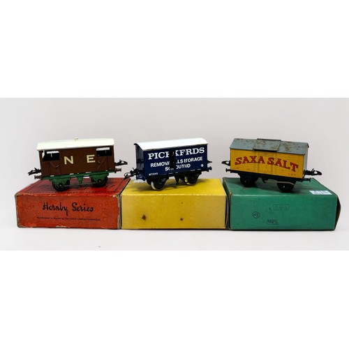 218 - Four assorted boxed Meccano Hornby ‘O’ gauge vans and wagons including RS655 Brake Van, Snow Plough,... 