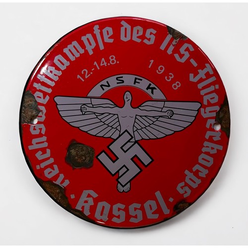 512 - A German Third Reich National Socialist Flyers Corps enamel circular plaque