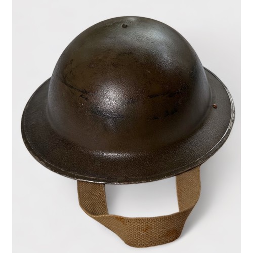 502 - Three WW2 Infantry Helmets, comprising a German Third Reich M42 helmet, beleived to have been found ... 