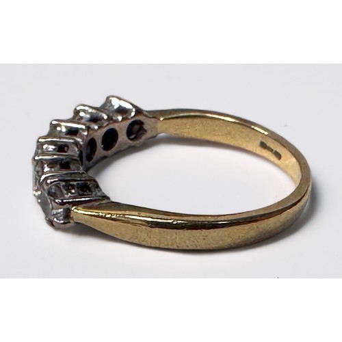 66 - An 18ct yellow gold ring, claw set with six round brilliant cut diamonds, total diamond weight 1.00c... 