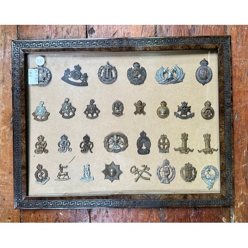 583 - A good collection of approximately 220 assorted cap badges including Royal North Lancashire regiment... 