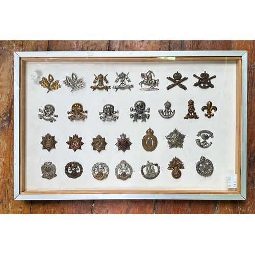 583 - A good collection of approximately 220 assorted cap badges including Royal North Lancashire regiment... 