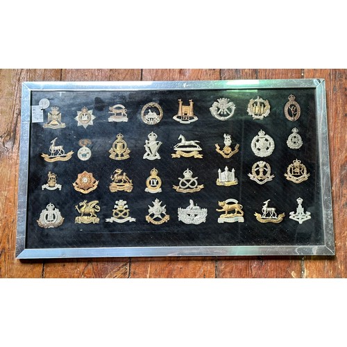 583 - A good collection of approximately 220 assorted cap badges including Royal North Lancashire regiment... 