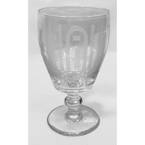 25 - A 19th century charging glass, decorated with engraved, cut and etched Masonic devices, raised on kn... 