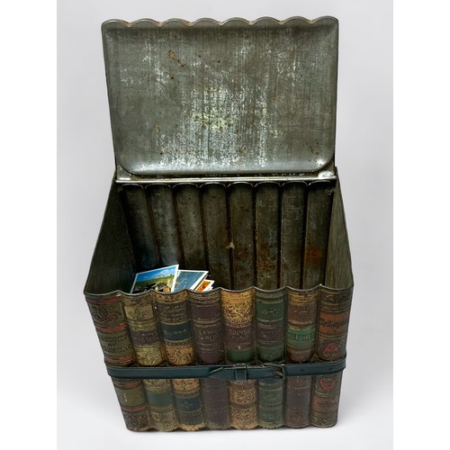 192 - A 20th century Huntley & Palmers advertising novelty biscuit tin formed as eight leather books with ... 