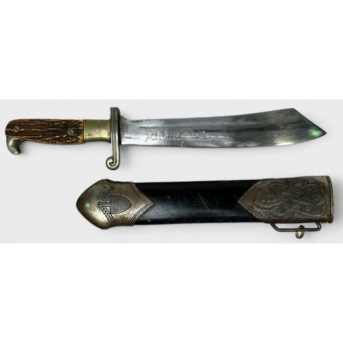 579 - A Reproduction German RAD Hewer, with antler style handle and white-metal mounted black metal scabba... 