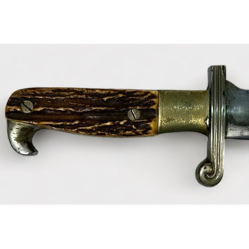 579 - A Reproduction German RAD Hewer, with antler style handle and white-metal mounted black metal scabba... 