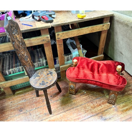 300 - An Egyptian camel stool with red velour upholstered cushion, together with a Welsh spinning stool