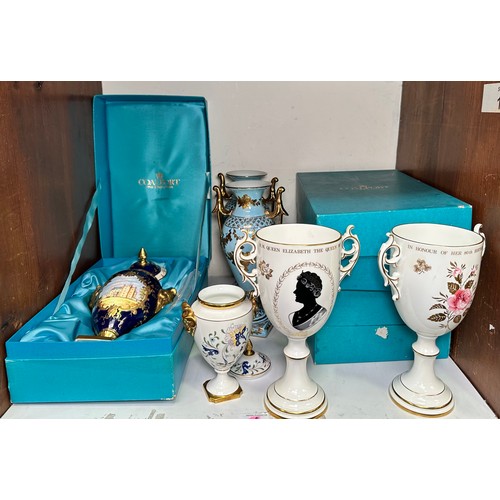 24 - Three boxed Coalport limited edition urns and covers including ‘Ram’s Head vase limited edition numb... 