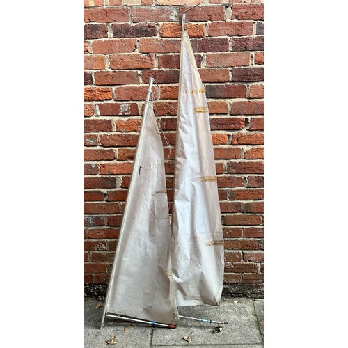 592 - A set of large pond yacht nylon sails with aluminium masts and boom, 68 inches high.