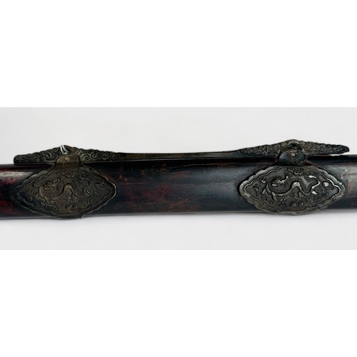 522 - A Chinese heavy Sword (Jian), the 31-inch double-edged steel blade with panels of dragons in relief,... 