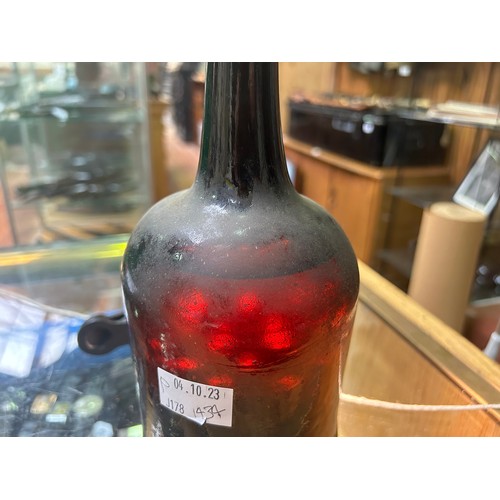 271 - A vintage bottle of Calvados Brandy, believed to be circa late 18th century, in hand-blown green gla... 