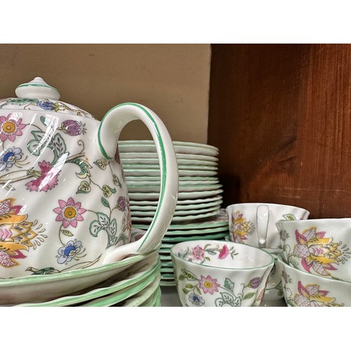 12 - A large Minton Bone China ‘Haddon Hall’ pattern part tea and dinner service, iconic floral decoratio... 