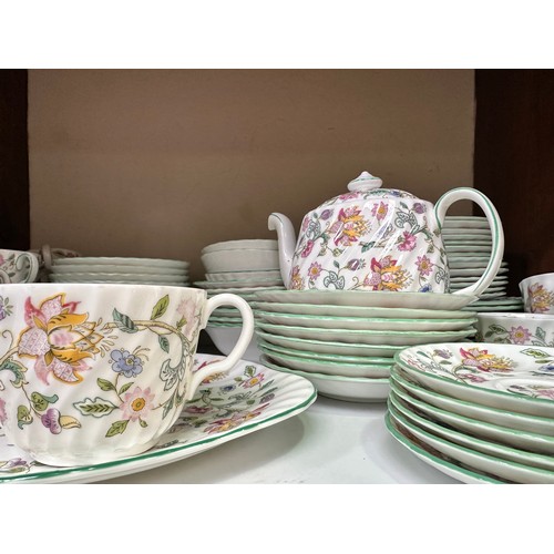 12 - A large Minton Bone China ‘Haddon Hall’ pattern part tea and dinner service, iconic floral decoratio... 