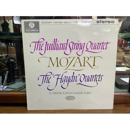 161 - A collection of fourteen assorted compositions of Wolfgang Amadeus Mozart and Johann Sebastian Bach ... 